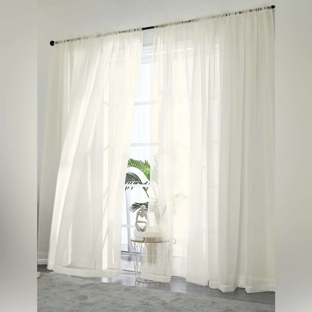 2 Elegant White Sheer Curtain Panels/ Drapes. Each panel is 40”x84” (2 pieces)